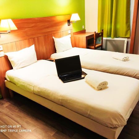 Glisy Hotel Luaran gambar