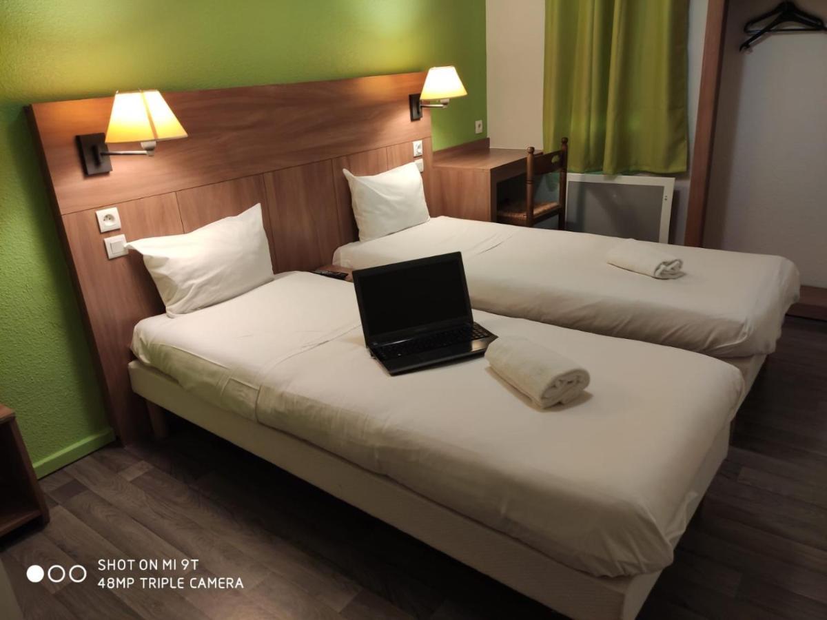 Glisy Hotel Luaran gambar
