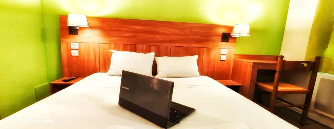 Glisy Hotel Luaran gambar