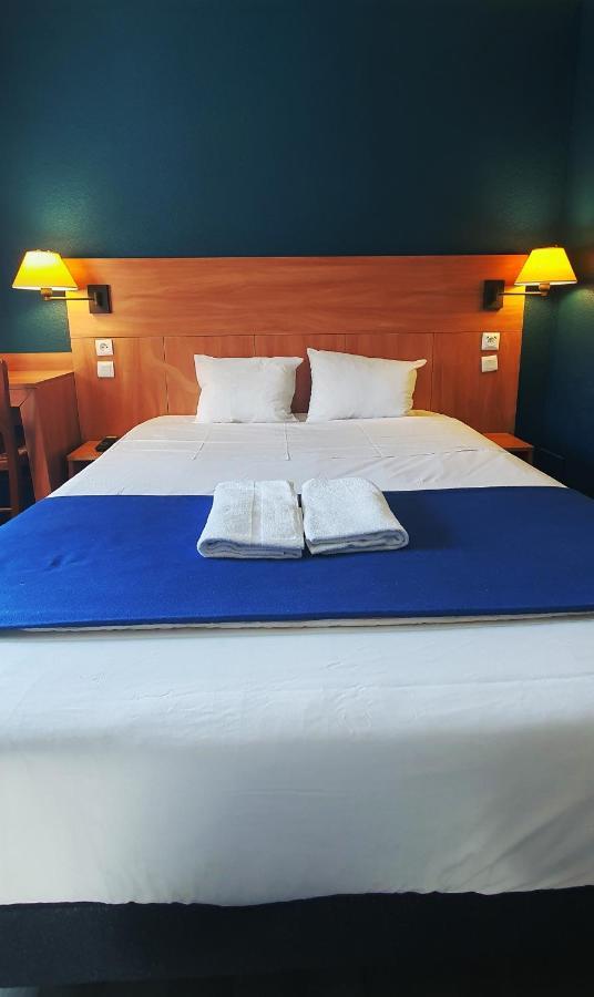 Glisy Hotel Luaran gambar