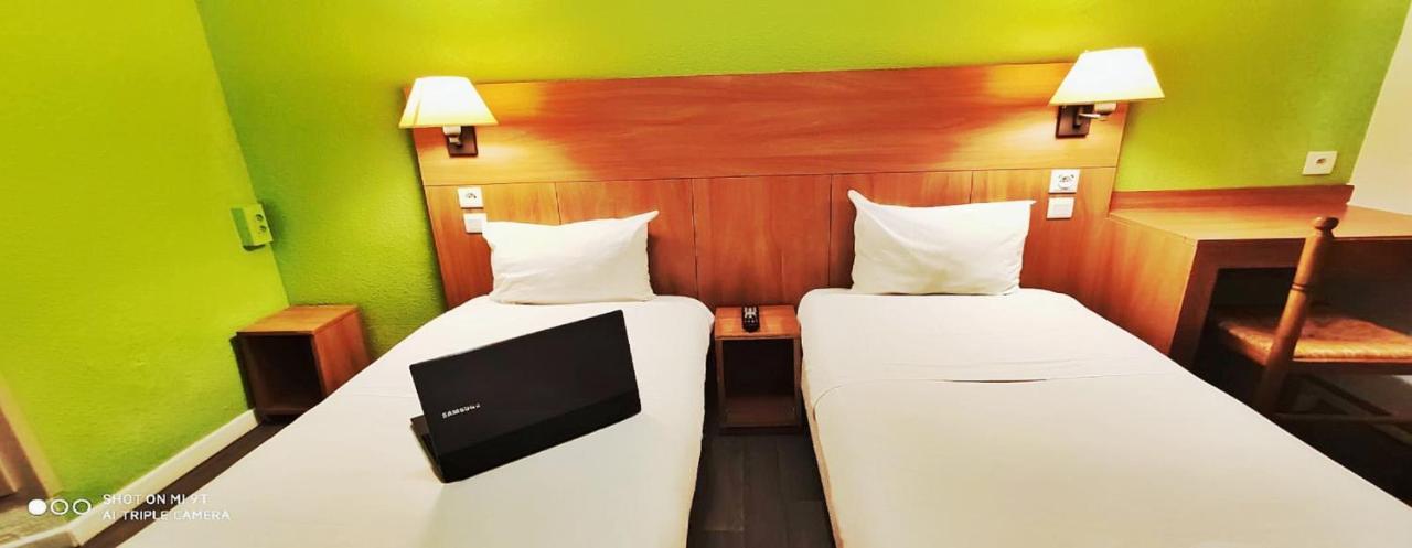 Glisy Hotel Luaran gambar